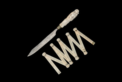 An ivory-handled knife depicting the theological virtue of faith and an ivory folding tailor's ruler, 17/18th and 19th C.