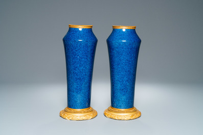 Une paire de vases en porcelaine de S&egrave;vres en bleu poudr&eacute; monochrome aux montures en bronze dor&eacute;, 19&egrave;me