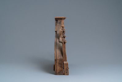 An arch-shaped carved oak baldachin or throne top, France, 15th C.