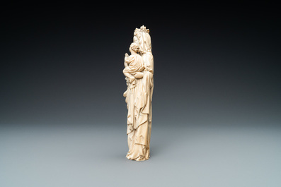 An ivory figure of a Madonna with child, probably France, 19th C.