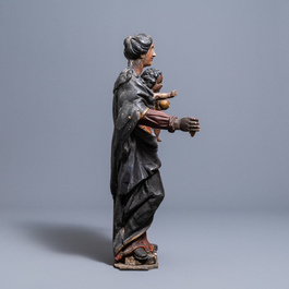 A large polychromed oak figure of a Madonna with child, 17th C.