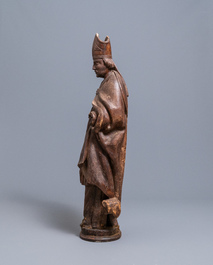 A large limewood figure of a bishop, 18th C.
