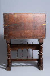 Un cabinet de type 'bargue&ntilde;o' en ch&ecirc;ne sculpt&eacute; aux montures en bronze, 16&egrave;me