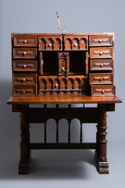 A Spanish bronze-mounted oak 'bargue&ntilde;o' or cabinet on stand, 16th C.