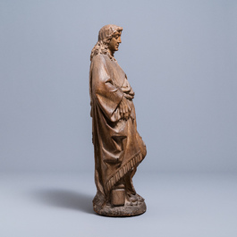 An oak figure of an angel holding the Instruments of the Passion, Germany or Mosan region, 16th C.