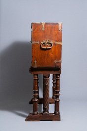 A Spanish bronze-mounted oak 'bargue&ntilde;o' or cabinet on stand, 16th C.