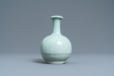 A Chinese monochrome celadon-glazed kendi, 19th C.