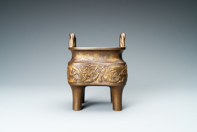 A Chinese partly gilded bronze censer with jade-topped wooden cover, Xuande mark, Kangxi