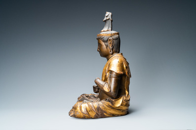 A large Japanese lacquered and gilded wooden figure of Kanon, Momoyama, 16th C.