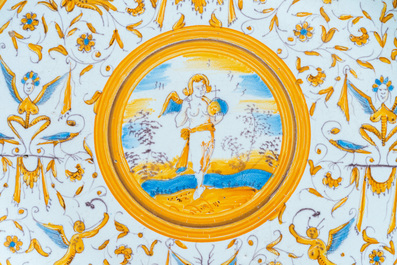 A polychrome 'grotesque' dish with a putto holding an orb, Willem Jansz. Verstraeten, Haarlem, 1645-1655