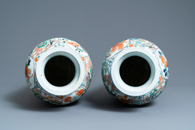 A pair of Chinese famille verte 'mythical animals' vases, Kangxi