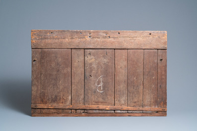 A carved oak front panel of a coffer with tracery panels, 15th C.