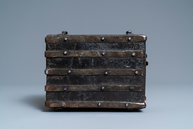 A chiseled leather-clad wooden travel casket, France, 15th C.