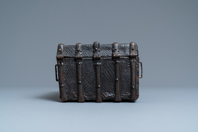 A chiseled leather-clad wooden travel casket, France, 15th C.