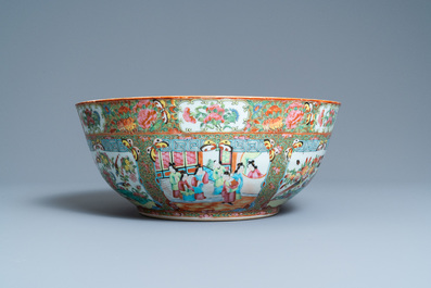 A large Chinese Canton famille rose bowl on wooden stand, 19th C.