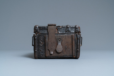 A chiseled leather-clad wooden travel casket, France, 15th C.