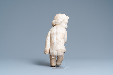 An alabaster figure of a putto with a bird on the knee, 17th C.