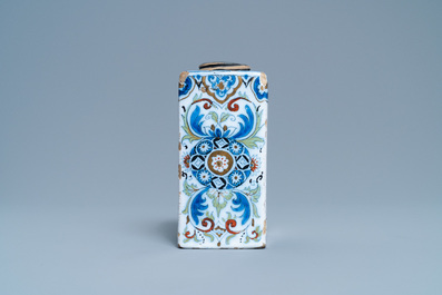 A polychrome Dutch Delft black- and gilt-enhanced tea caddy, late 17th C.