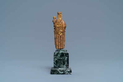 A miniature polychromed and gilded walnut figure of a Madonna with child, so called 'Poup&eacute;e de Malines', 2nd half 15th. C.