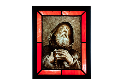 Two composite stained and painted glass windows with a monk and a female bust after Rapha&euml;l, 19th C.