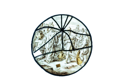 A pair of grisaille and silver yellow painted glass roundels with biblical scenes, France, 17th C.