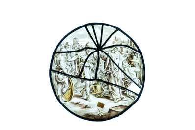 A pair of grisaille and silver yellow painted glass roundels with biblical scenes, France, 17th C.