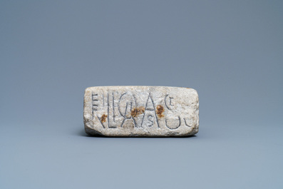 An inscribed Romanesque reliquary altar stone, France, 12th C.