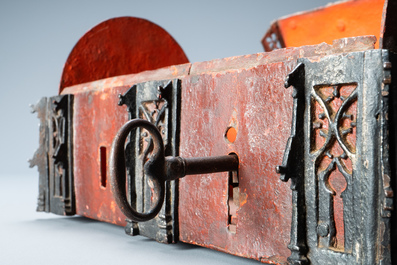 A partly red painted cast iron casket, France, 15th C.