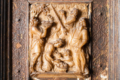 An alabaster carving depicting 'The collection of manna', Malines, monogram IT for Issaak Tissenaken, 1st half 17th C.