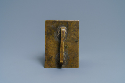 An Italian bronze pax with a 'Crucifixion' plaquette after a design by Moderno, ca. 1500