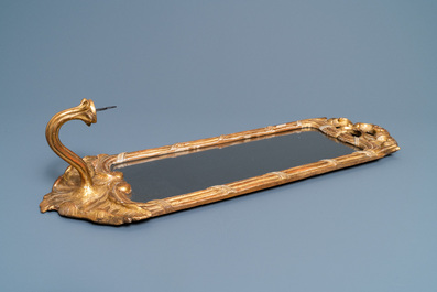 A pair of gilded wooden mirrors with candle holders, France or Italy, 17/18th C.