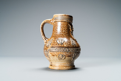 A German stoneware bellarmine jug with a text band and portrait medallions, Frechen, 16th C.