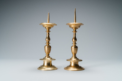 A pair of brass alloy candlesticks, Italy, 17th C.