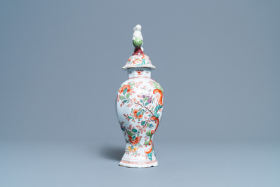 A polychrome petit feu and gilded Dutch Delft covered vase, a shoe and a pair of cashmere palette covered vases, 18/19th C.