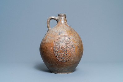 A large German stoneware bellarmine jug with three armorial medallions, Frechen, 1st half 17th C.