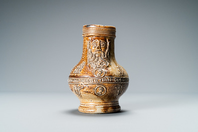 A German stoneware bellarmine jug with a text band and portrait medallions, Frechen, 16th C.