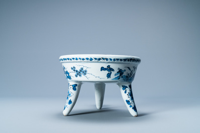 A rare Dutch Delft blue and white warming bowl with the arms of the Austrian von Zinzendorf family, late 17th C.