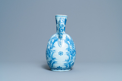 A large Dutch Delft blue and white chinoiserie ewer, 17th C.