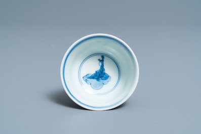 Two Japanese blue and white Arita plates and a cup and saucer, Edo, 17/18th C.