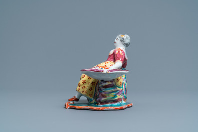 A Dutch Delft polychrome petit feu figural salt cellar, 18th C.