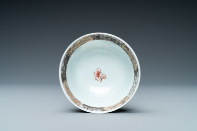 A Chinese famille rose 'harvesting' cup and saucer, Yongzheng