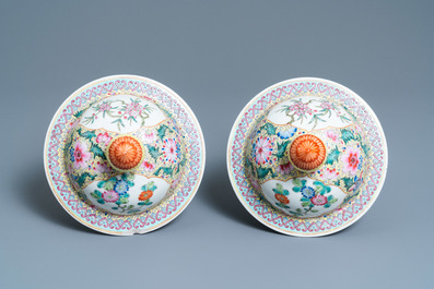 A pair of Chinese famille rose yellow-ground vases and covers, Qianlong mark, Republic