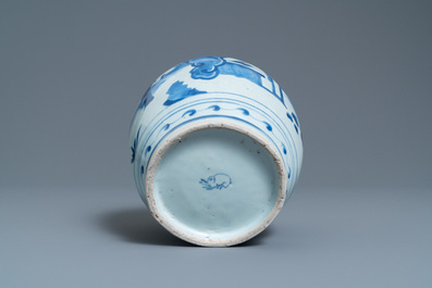 A Chinese blue and white jar with figures in a landscape, hare mark, Wanli