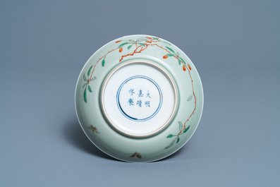 A Chinese famille verte celadon-glazed plate, Wanli mark, Kangxi/Yongzheng