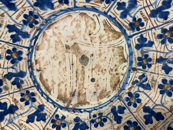 A Hispano-Moresque 'IHS' lusterware dish, Manises, Spain, 15th C.