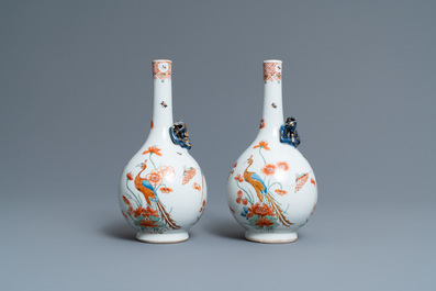 A pair of Chinese Dutch-decorated Kakiemon-style bottle vases, Kangxi