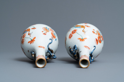 A pair of Chinese Dutch-decorated Kakiemon-style bottle vases, Kangxi