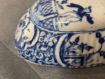 A ribbed Dutch Delft blue and white chinoiserie brush back, 18th C.