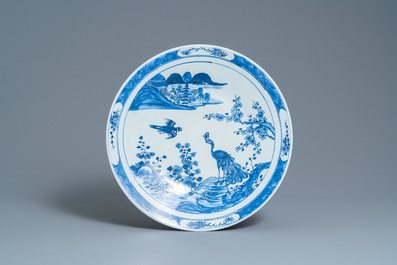 A Chinese famille verte 'yenyen' 'rice production' vase and a large blue and white 'peacock' dish, 19th C.