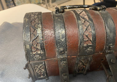 A partly red painted cast iron casket, France, 15th C.